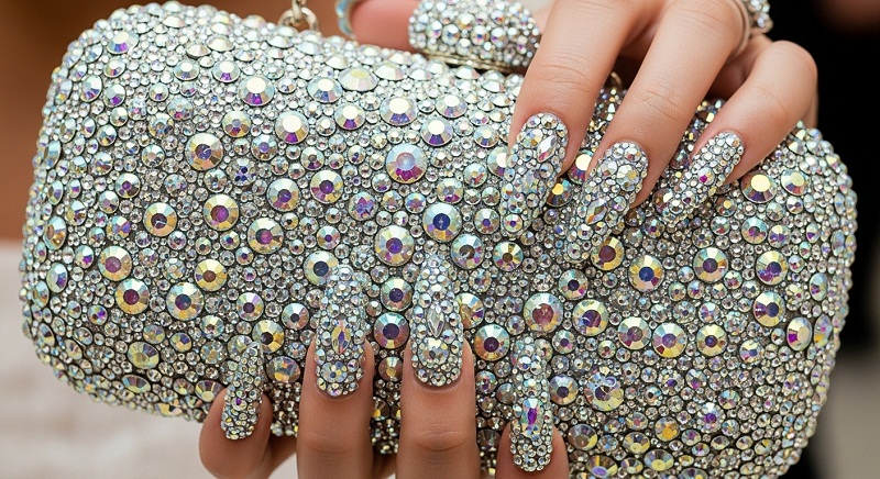 Rhinestone Nail Art: Crystal Designs, Tips & Techniques Close-up of crystal rhinestones applied to gel nails